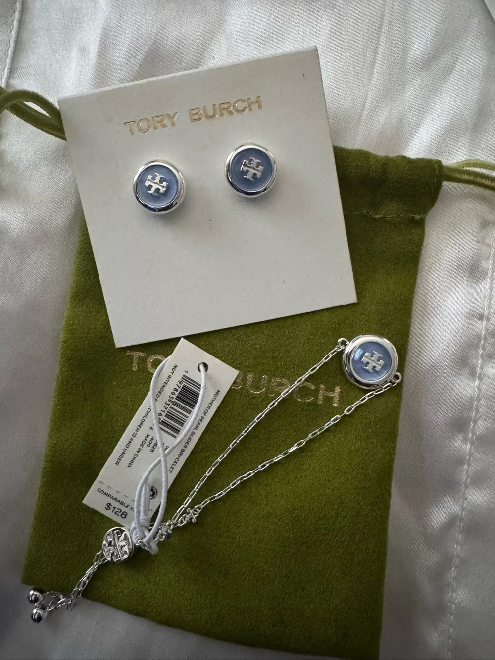 Tory Burch Light Blue Enamel Logo Studs and bracelet set.